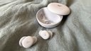 lilac soundcore sleep a30 special earbuds and case on blue blanket