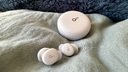 lilac sleep a30 earbuds on blue blankets